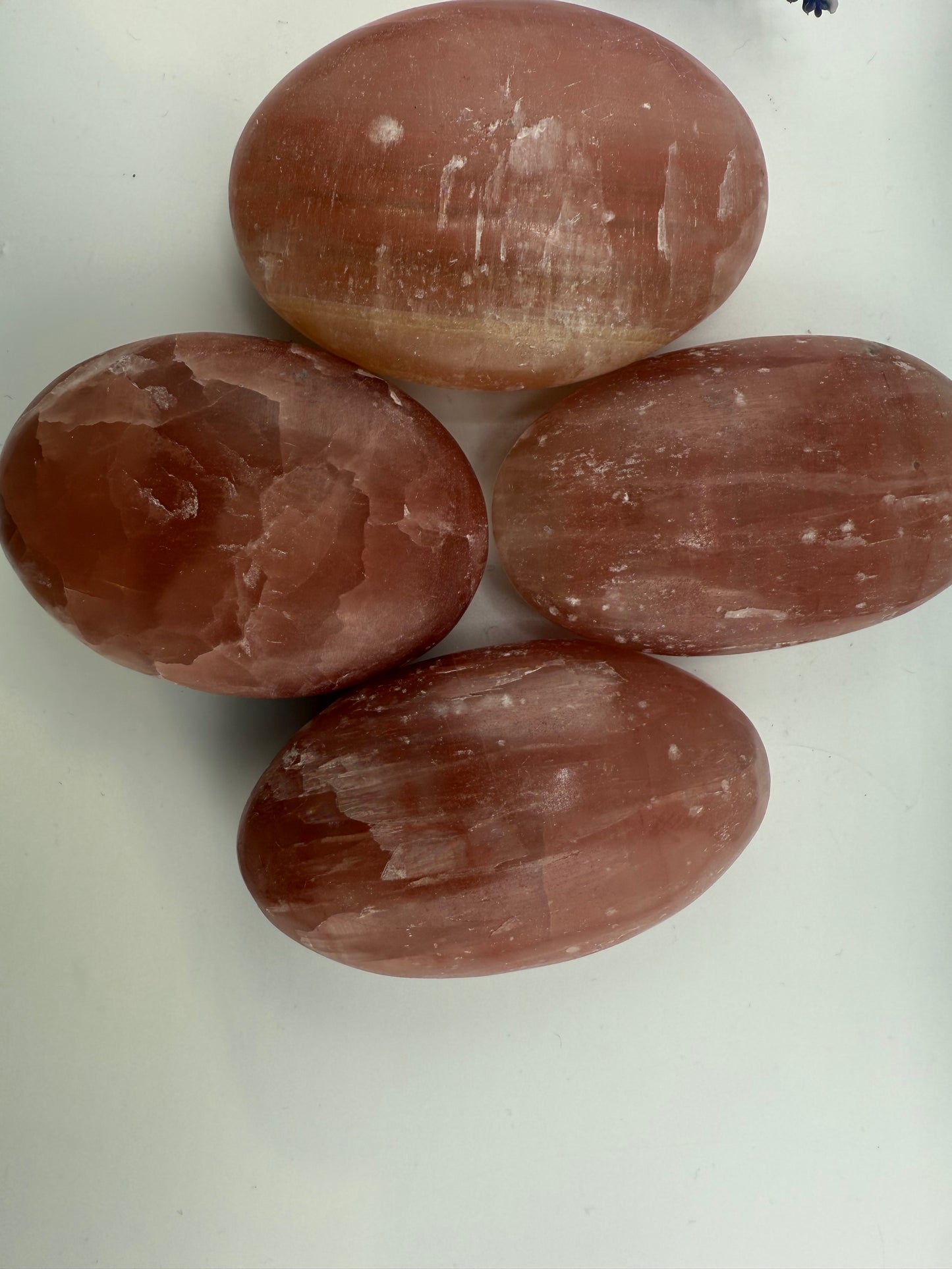 Red Calcite Palm Stones