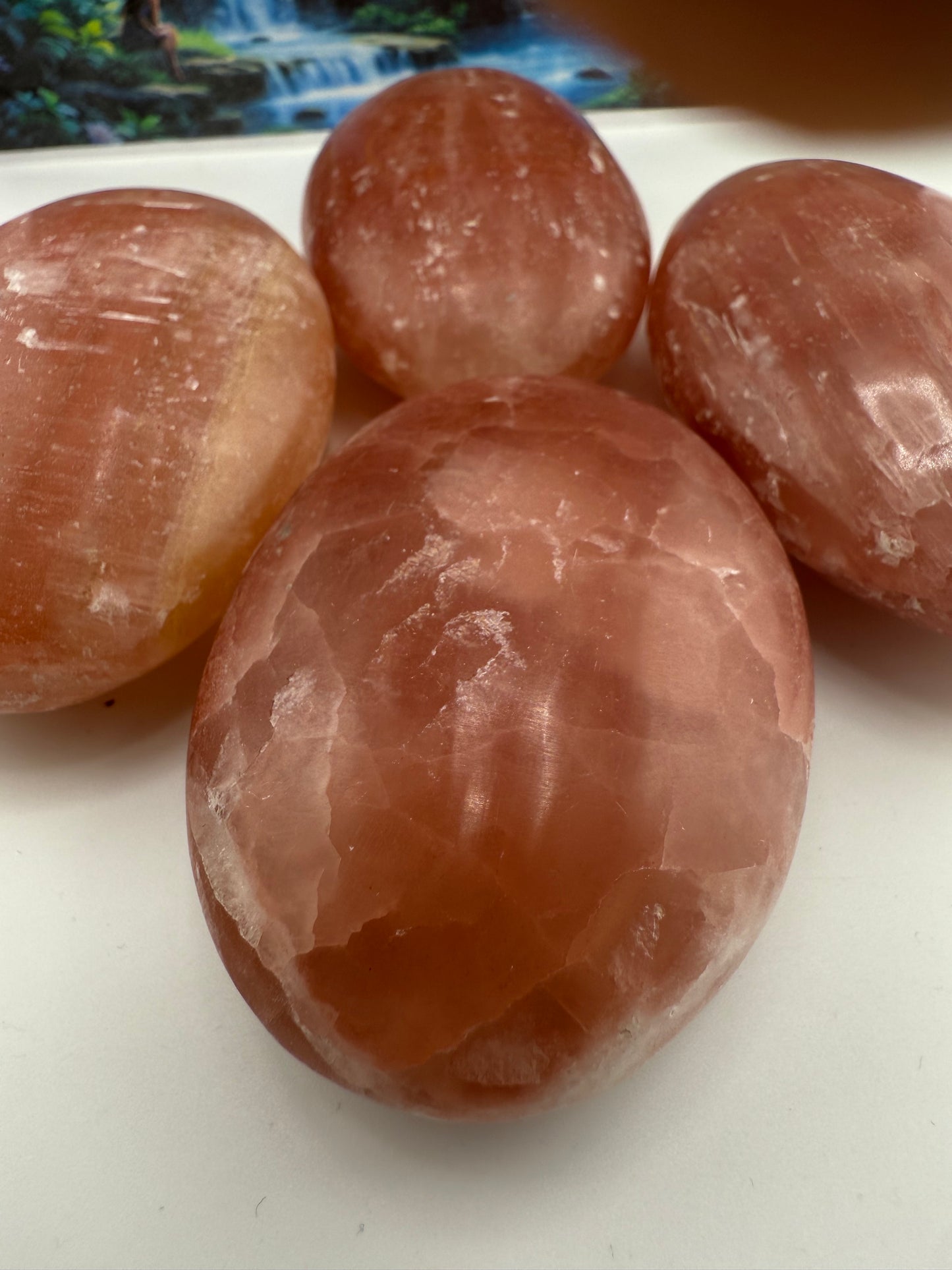 Red Calcite Palm Stones
