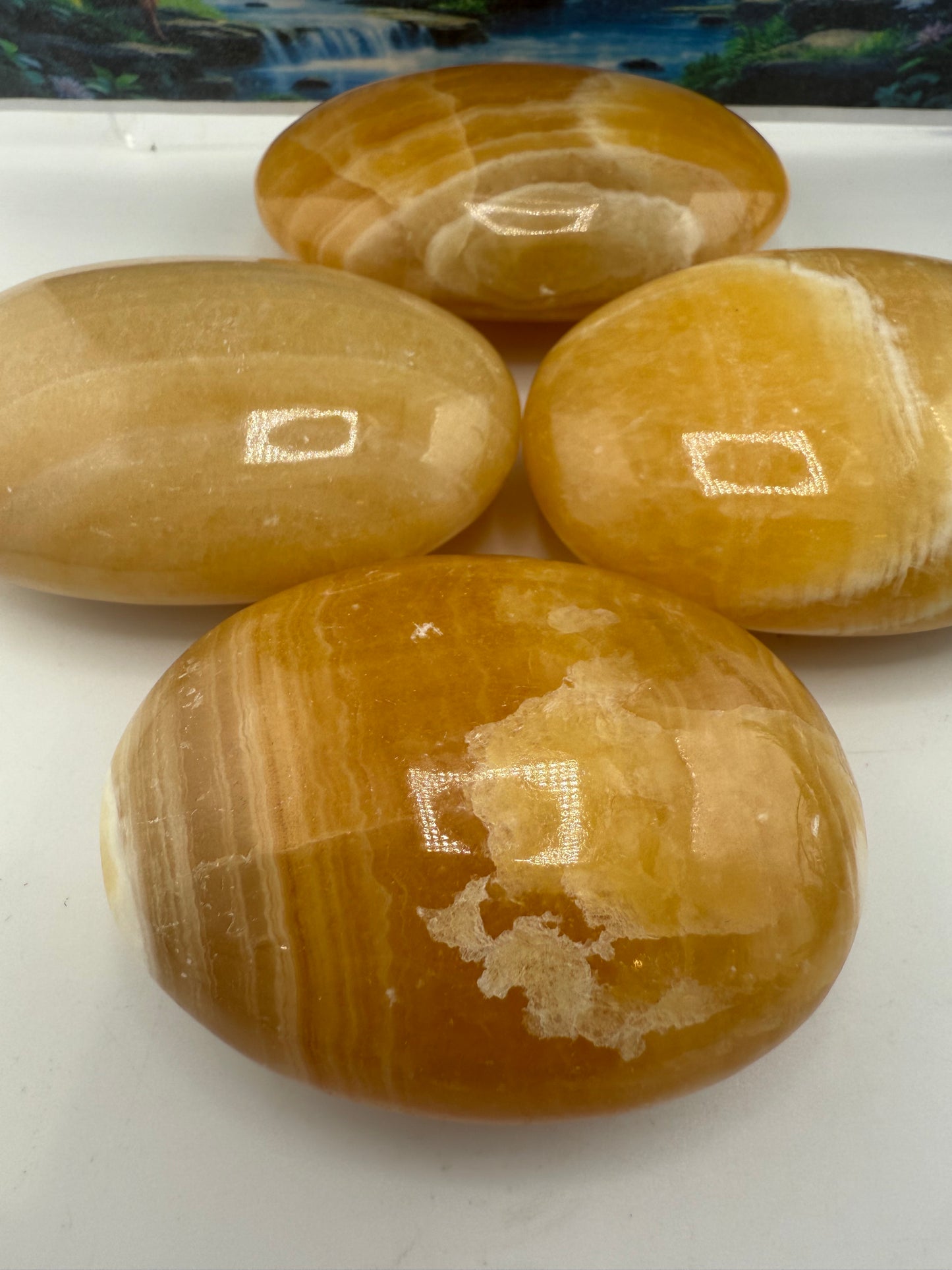 Orange Calcite Palm Stones