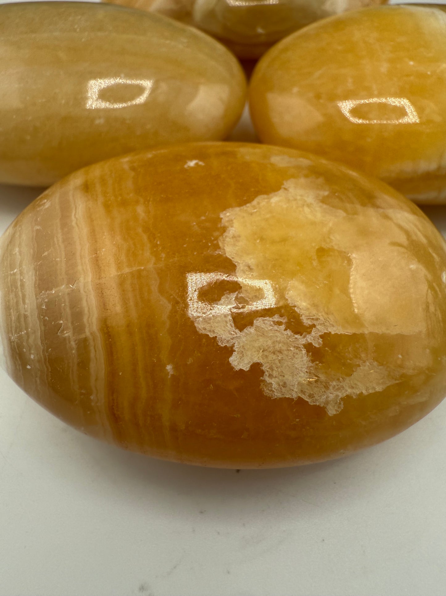 Orange Calcite Palm Stones